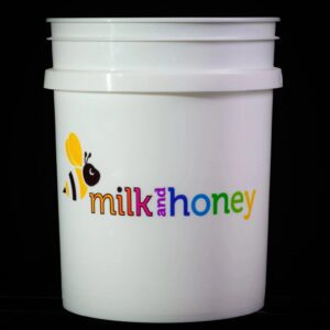 Milk and honey print white bucket